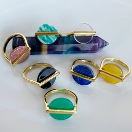 Gold-plated statement ring with a variety of semi-precious stone options, including rhodonite, quartz crystal, onyx verte, lapis lazuli, yellow chalcedony, amazonite, and black onyx. Available in sizes 52, 54, and 56.