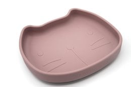 Silicone dish with suction in dusty mauve color, designed for kids' plates. Features a cat-shaped design with a shallow bowl for serving food.