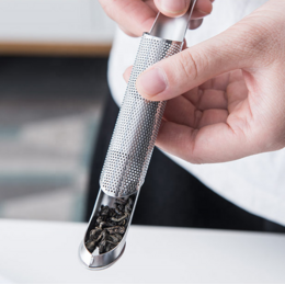 Stainless steel telescopic tea infuser with perforated design for steeping loose leaf tea.