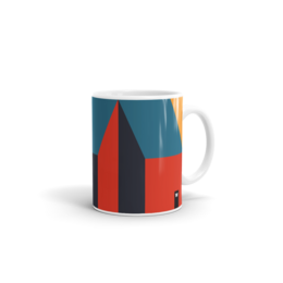 Colorful geometric pattern mug with abstract triangular design in shades of blue, red, and yellow.
