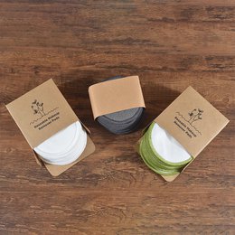 Bamboo makeup remover pads in various colors including white, green, gray, black, rainbow, and sky blue. The pads are made of soft, reusable velvet material and come in packs of 5 or 10.
