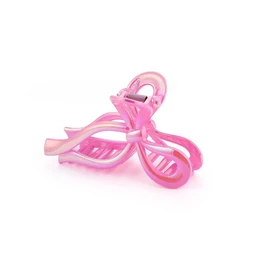  A pink hair clip with a bow-like design. The clip is made of a soft, flexible material and has a simple, minimalist style.