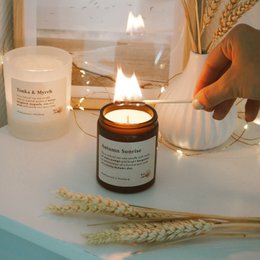 Autumn Sunrise 155 g. Candle - Warm, earthy scented candle with a round, tall shape made of natural materials.