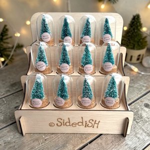 Christmas trees in a bell jar