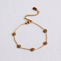 Roestvrij stalen armband met fijne madeliefjesbloem - goud