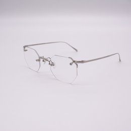 Rimless, crystal clear sunglasses with a sleek, modern design.
