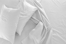  White cotton percale sheet set with 1 duvet cover, 1 fitted sheet, and 1-2 pillow cases. Soft, breathable, and durable material for a comfortable sleep experience.