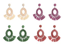 Colorful raffia and metal earrings in various fan-shaped designs, including shades of beige, green, purple, and red.
