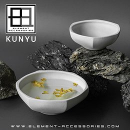 Modern Asian-style serving bowl with high-end design and finish. Made of durable, white ceramic material. Suitable for serving soups, salads, or other dishes.