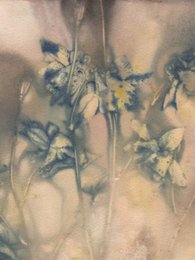 A serene floral wall art piece featuring soft blue and tan hues with delicate yellow flowers.
