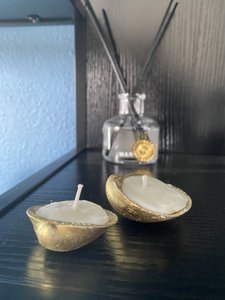 Goldene Muschelkerzen
