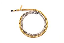 A gold-toned metal chain lanyard with a clasp closure, suitable for holding glasses or other accessories.