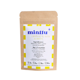  Yellow and white round xylitol candies, lemon flavor, kraft paper pouch packaging, sugar-free sweets.