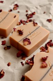 Natural, vegan, palm oil free soap with flower blossom scent and dried flower petals.
