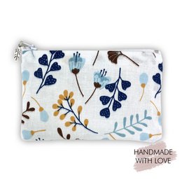  A small white wallet with a floral pattern in navy blue, mustard yellow, and light blue. The wallet has multiple pockets for coins and cards.