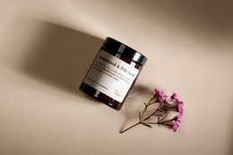 Sandalwood and palo santo scented candle with a warm, earthy aroma.