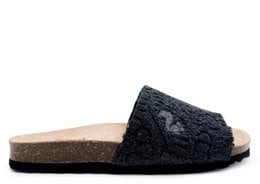 Black vegan terry slide sandal with cork sole. Comfortable and eco-friendly design.