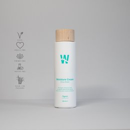 Organic bio moisture cream, a hair conditioner with a white bottle and green label. The product is suitable for shampoos.