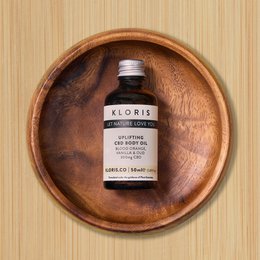Uplifting CBD body oil with blood orange, vanilla, and spice notes. Moisturizing formula for glowing skin.