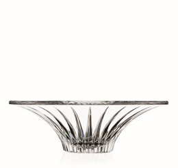  A low, round decorative bowl made of clear glass with a timeless, elegant design featuring a flared, fan-shaped profile.