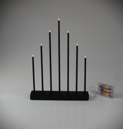  Black LED candle arch with 7 lights, 24cm in height, battery-powered.