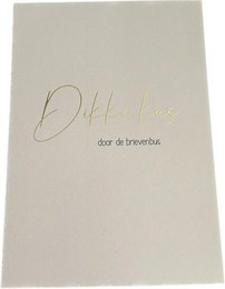 A gold foil greeting card with the text "Dear love" in cursive font.