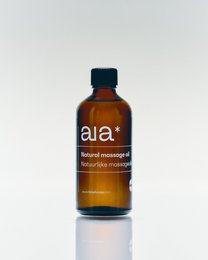  Natural massage oil in amber glass bottle. Organic, vegan, and cruelty-free ingredients.