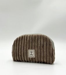  A beige corduroy vanity bag with a waterproof interior, suitable for storing cosmetics and personal items.