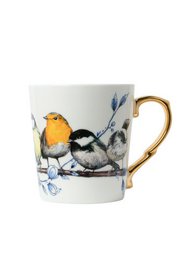 A ceramic mug featuring a colorful bird design with gold accents. The mug has a round, tall shape and is suitable for hot beverages.