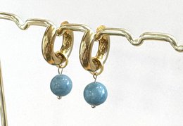  Gold-tone hoop earrings with light blue chalcedony beads.