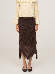 Chocolat brown lace skirt with floral print blouse, featuring a long, flowing silhouette and delicate lace detailing.