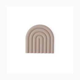  Colorful, arched trivet made of durable material, suitable for protecting surfaces from hot dishes.