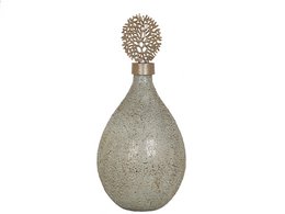 Silver glass bottle with golden metal lid. Tall, oval-shaped bottle with a decorative metal lid. Suitable for travel or storage.