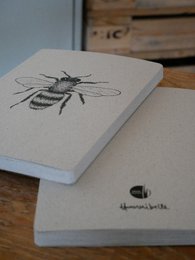 Grass paper notebook bee