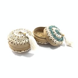 Decorative storage basket made of bamboo with beads and cowrie shells in blue, white, black, and pink color variants.