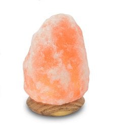 A tall, round Himalayan salt lamp with a wooden base, standing 18 cm high and featuring an orange glow.