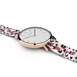 Stylish watch with a leopard print strap, available in silver and rose gold finishes.