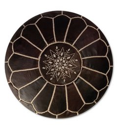 Dark brown Moroccan leather pouf cover with intricate star-shaped pattern. Suitable for use as an ottoman or footstool.