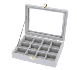  Gray jewelry box with 12 compartments and glass lid for storing and displaying jewelry.