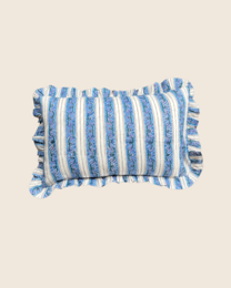  Rectangular blue and white striped cushion with tasseled edges.