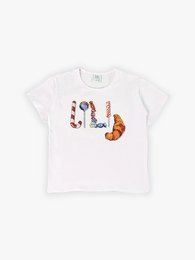 White t-shirt with colorful candy logo design for kids. Short-sleeved, casual style top suitable for everyday wear.