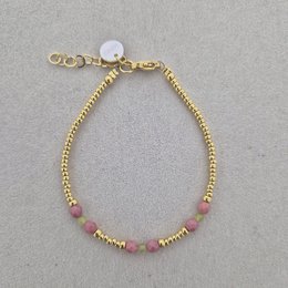 Gold beaded bracelet with pink tourmaline stones and white pearl charm detail