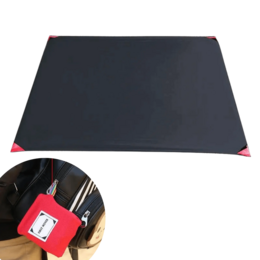 Outdoor camping pocket mat, dark gray trapezoid shape, red compact pouch, portable with sardines included.