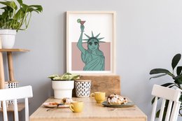 Statue of Liberty wall art featuring a stylized illustration of the iconic landmark. The artwork showcases the Statue's distinctive green color and torch, capturing the symbol of freedom and democracy.