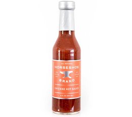 Cayenne hot sauce, a spicy and flavorful chili sauce made with cayenne peppers. Features a vibrant red color and a bold, peppery taste.