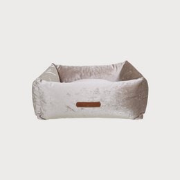 Soft rectangular dog bed, light beige and milky white, cozy cushioned pet bed with brown leather handle.