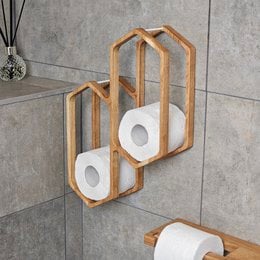 Wooden toilet paper holder with storage for 4 rolls, available in natural, brown, rustic white, and black finishes. Compact organizer for bathrooms.