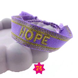  Woven statement bracelet in purple and gold color with the word "HOPE" printed on it. Made of durable material, suitable for everyday wear.