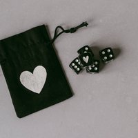 Dice set black (PU = 8 sets)
