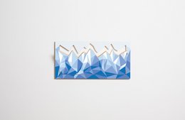 Fläpps Wardrobe/Coatrack Hillhang - Icemountain, a modern shelving unit with a geometric, icy blue design.